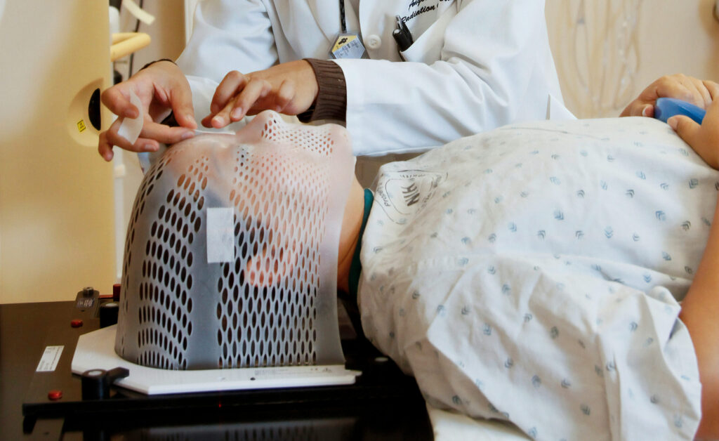 Photo of a person laying down for radiotherapy